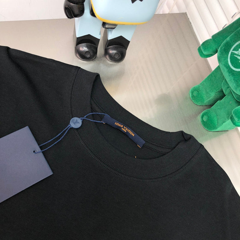 Side profile of Louis Vuitton cotton t-shirt with label-forward styling