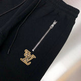 Full styled look of Louis Vuitton luxury clothing with signature branding