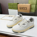 Gucci Designer sneakers in crisp white retro runner design front view