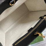Close-up detail of sleek everyday-luxe women's handbag – women's luxury handbag