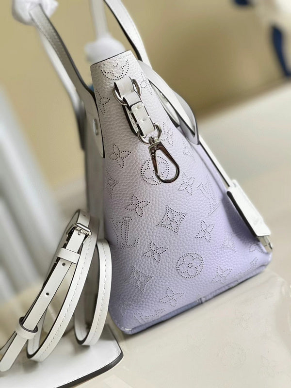 Styled lifestyle shot of structured sleek women's handbag – women's designer-style accessory