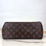 Side profile of signature modern women's handbag – women's statement bag