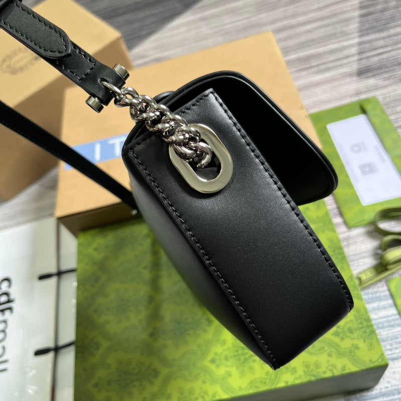 Styled lifestyle shot of sleek structured women's handbag – women's premium purse