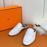 Hermès Black Loafer Flats - Angled View
