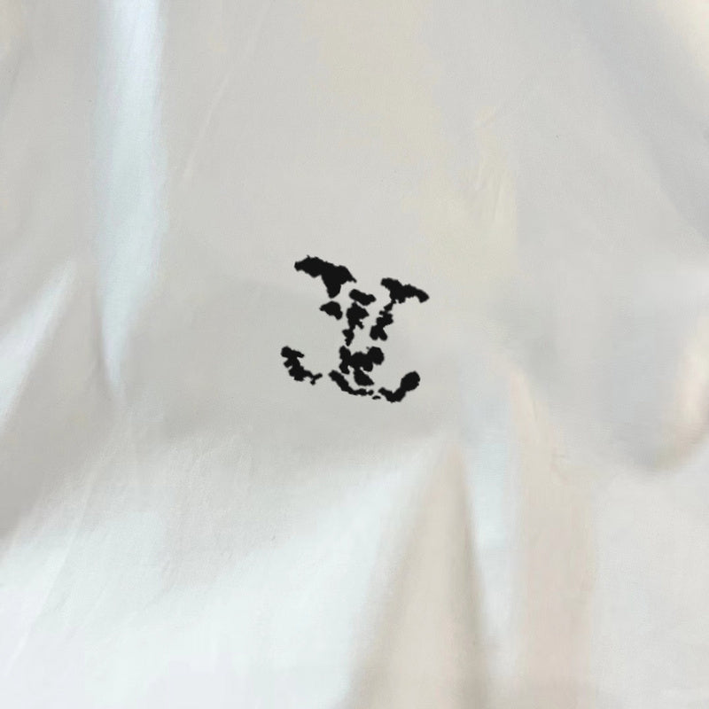 Back view of Louis Vuitton luxury clothing with tailored silhouette