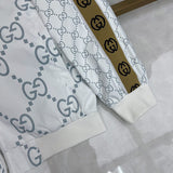 Close-up detail shot of Gucci luxury clothing with logo-detail design
