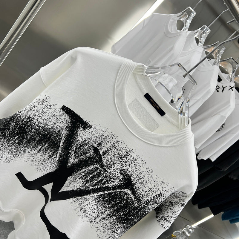 Close-up detail shot of Louis Vuitton luxury clothing with relaxed-fit cut