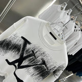 Close-up detail shot of Louis Vuitton luxury clothing with relaxed-fit cut
