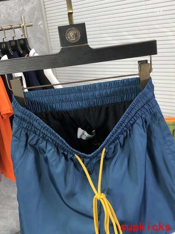 Back view of Rhude luxury clothing with label-forward styling