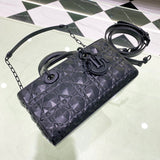 Handle and strap detail of elevated modern women's handbag – women's luxury accessory