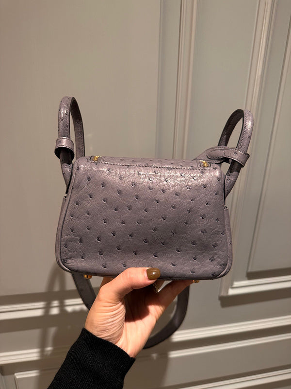 Side view of considered structured handbag