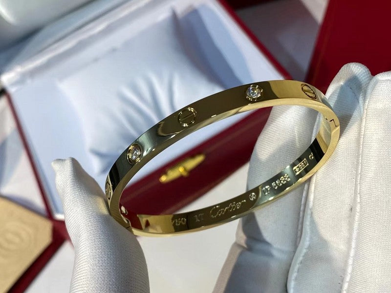 Side view of Cartier unisex jewelry piece