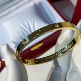 Side view of Cartier unisex jewelry piece