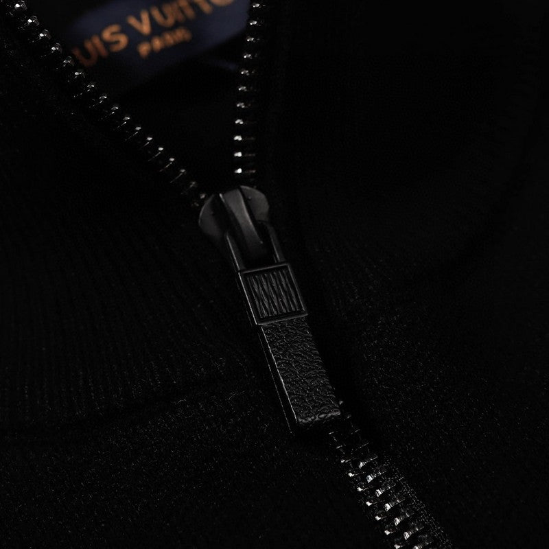 Flat lay presentation of Louis Vuitton luxury clothing with relaxed-fit cut