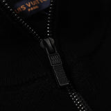 Flat lay presentation of Louis Vuitton luxury clothing with relaxed-fit cut