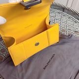 Side profile of signature statement women's handbag – women's statement bag