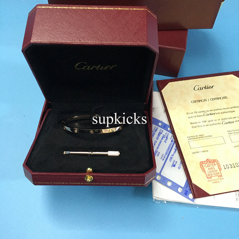 Side view of Cartier unisex jewelry piece