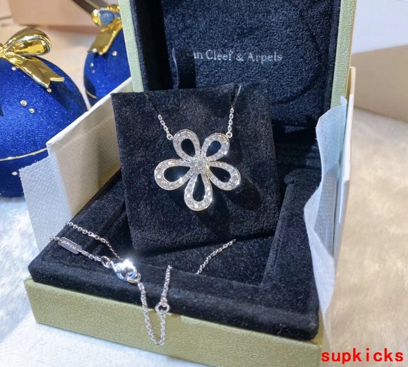 Lifestyle view of Van Cleef & Arpels unisex jewelry piece