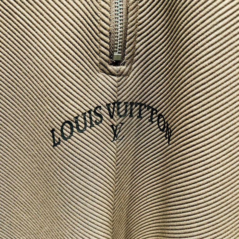 Full styled look of Louis Vuitton luxury clothing with monogram-inspired silhouette
