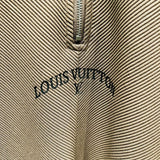 Full styled look of Louis Vuitton luxury clothing with monogram-inspired silhouette