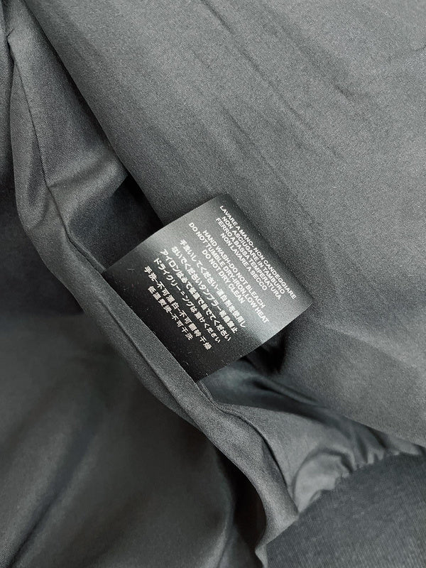 Front view of Gucci luxury clothing with logo-detail design