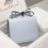 Side view of streamlined structured handbag
