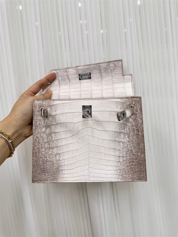 Side view of sculpted structured handbag