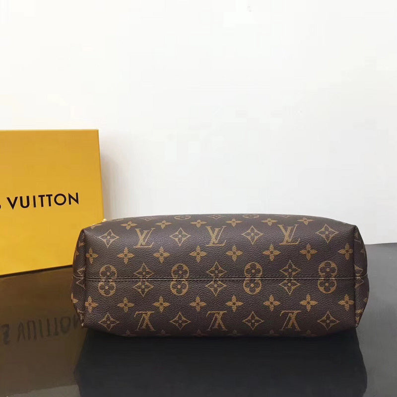 Back view of polished elevated women's handbag – women's statement bag