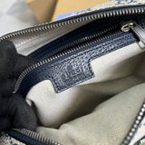 Side profile of structured classic women's handbag – women's luxury handbag