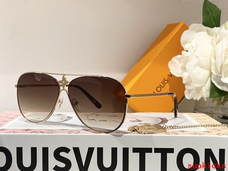 Close-up detail view of Louis Vuitton unisex sunglasses