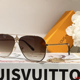Close-up detail view of Louis Vuitton unisex sunglasses