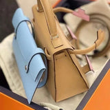  streamlined top-handle bag detail view showing craftsmanship