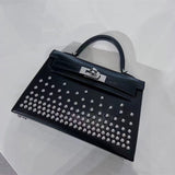  Graceful top-handle bag carried on shoulder 10