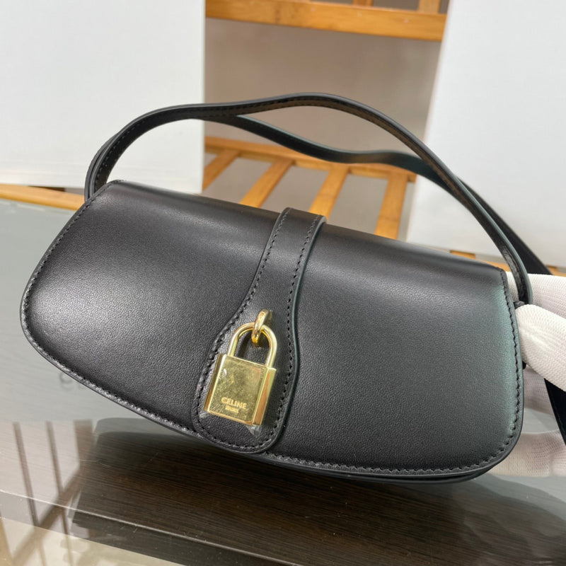 Handle and strap detail of classic refined women's handbag – women's luxury handbag
