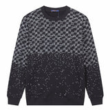 Close-up detail shot of Louis Vuitton luxury clothing with runway-inspired design