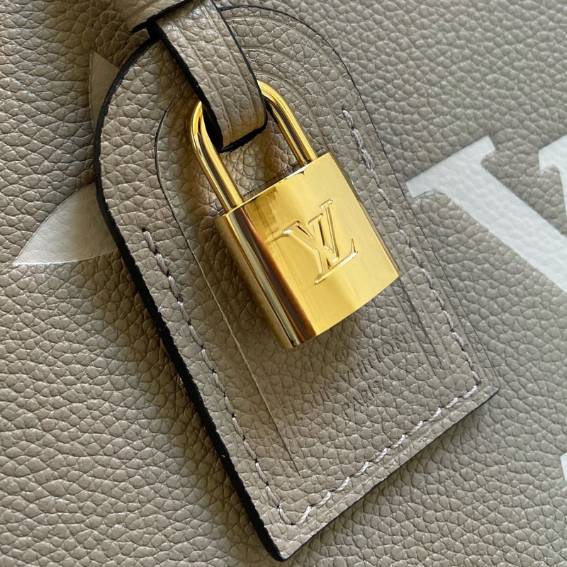 Handle and strap detail of premium refined women's handbag – women's luxury accessory