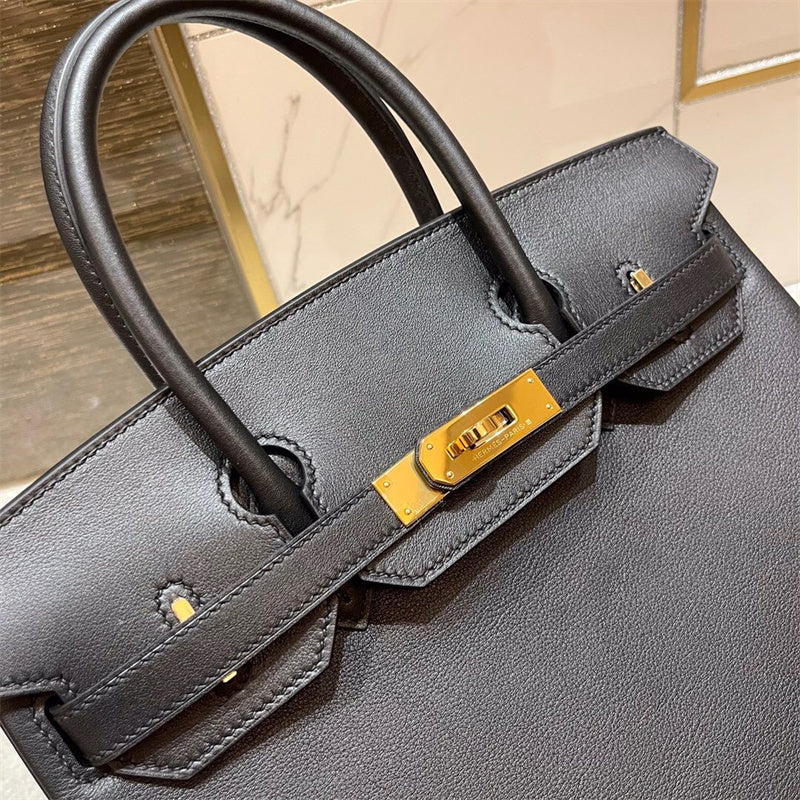 Side view of refined structured handbag