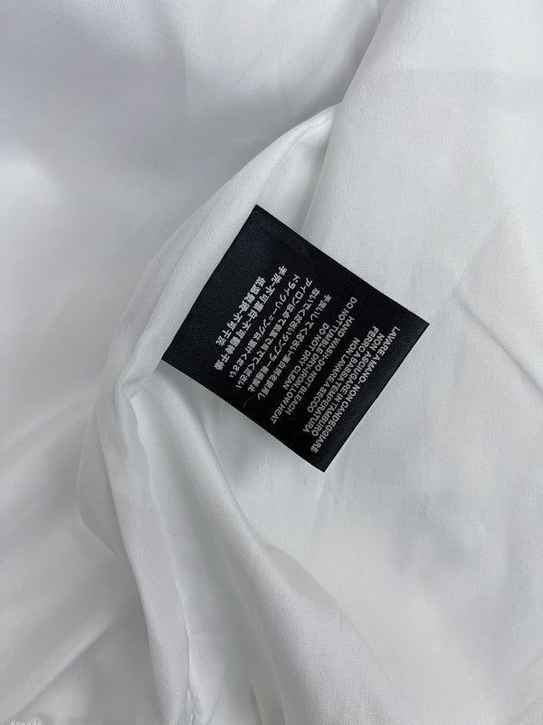 Front view of Gucci luxury clothing with logo-detail design