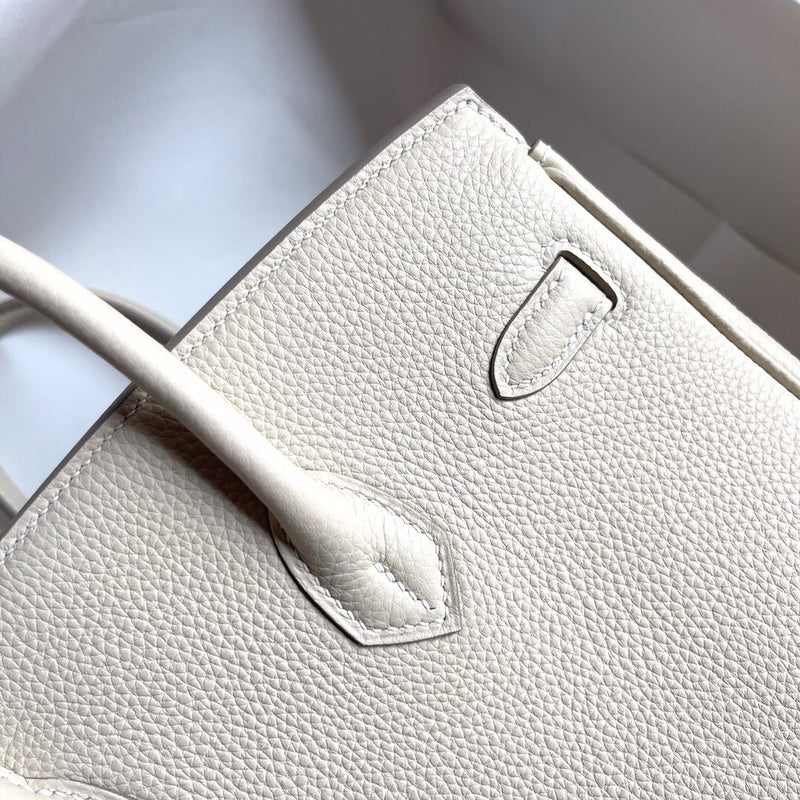 Side view of statement structured handbag