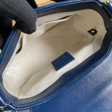 Front view of structured classic women's handbag – women's luxury handbag