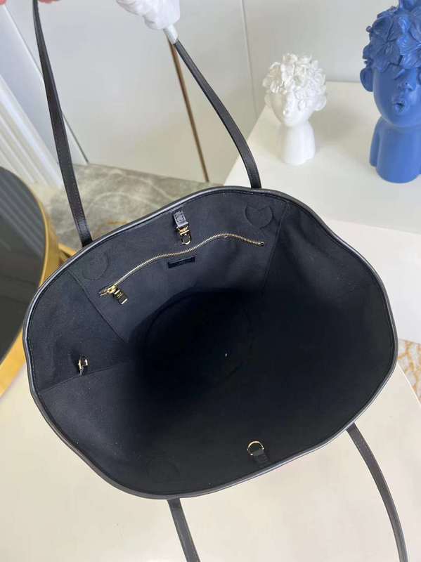 Close-up detail of signature statement women's handbag – women's statement bag