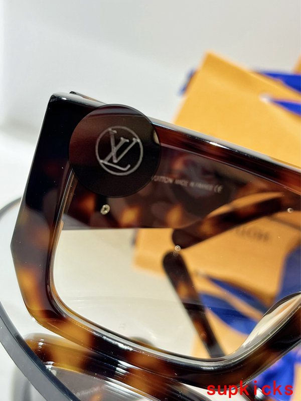 Close-up detail view of Louis Vuitton unisex sunglasses