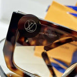 Close-up detail view of Louis Vuitton unisex sunglasses