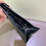Side view of considered structured handbag