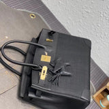 Side view of refined structured handbag