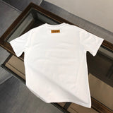 Close-up detail shot of Louis Vuitton cotton t-shirt with streetwear-inspired cut