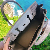  signature structured bag detail view showing craftsmanship