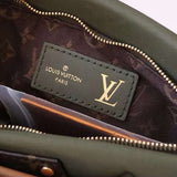 Front view of classic sleek women's handbag – women's statement bag