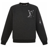 Back view of Louis Vuitton luxury clothing with signature branding