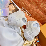 Texture and finish detail of Louis Vuitton luxury piece style No.044